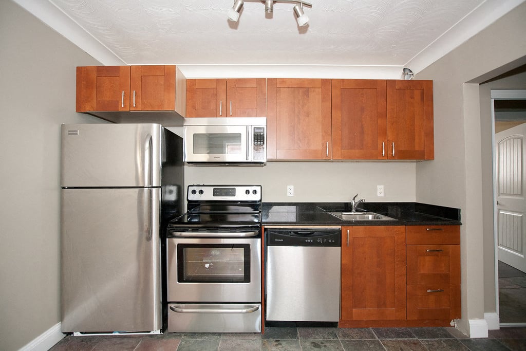 Kitchen with stainless steel appliances at 18 Elm Street, Kingston